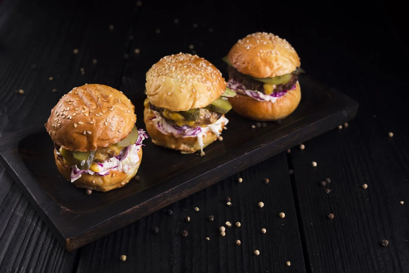 high-angle-set-burgers-wooden-board.jpg